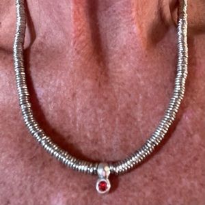 Pretty Uno de 50 Silver Disk Necklace With Bright Coral Swarovski Round Crystal